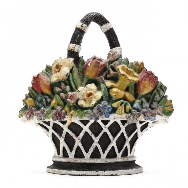 a-large-vintage-cast-iron-floral-doorstop