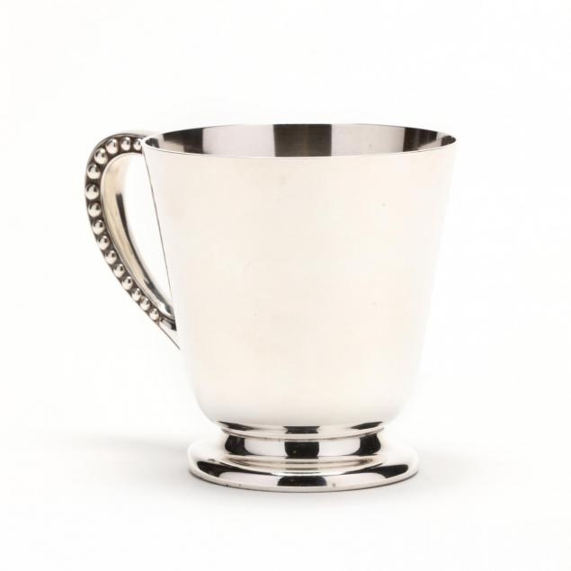 a-sterling-silver-cup-retailed-by-cartier
