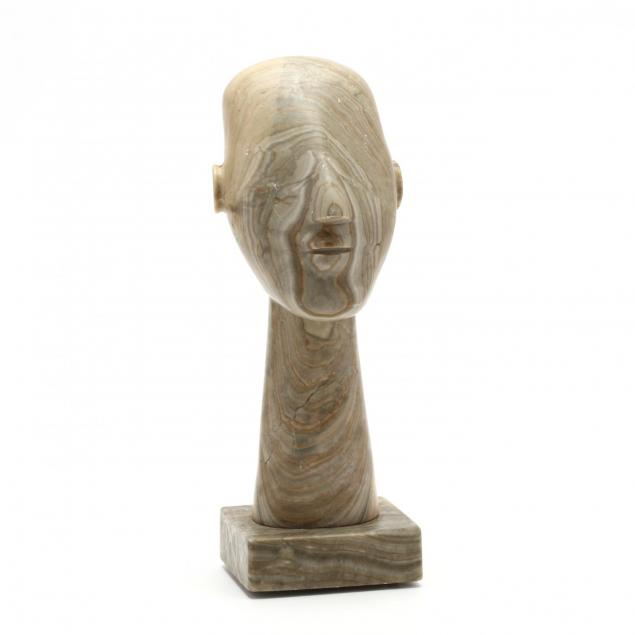 easter-island-style-carved-stone-bust