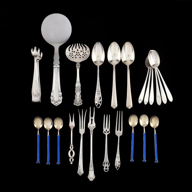 a-group-of-sterling-silver-flatware