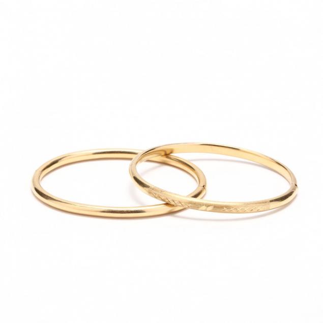 two-18kt-gold-bangles