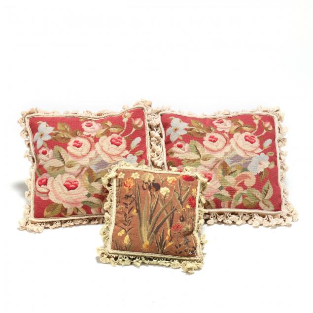 three-needlepoint-pillows