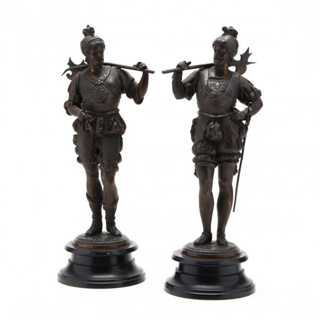 a-pair-of-antique-sculptures-of-conquistadors