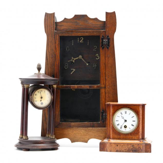 three-antique-wooden-cased-clocks