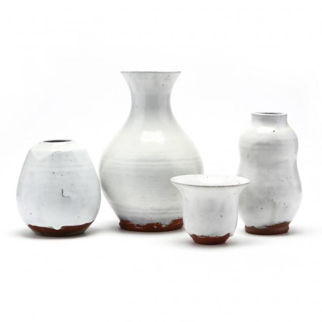 a-group-of-four-jugtown-chinese-white-vases