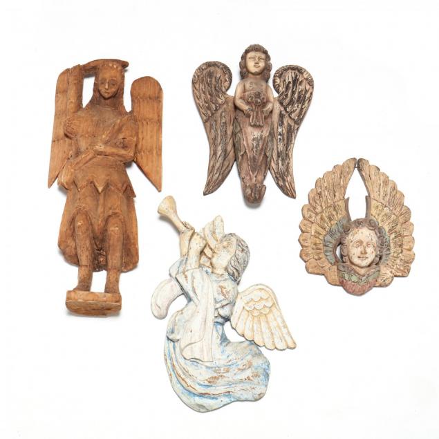 four-carved-wood-angels