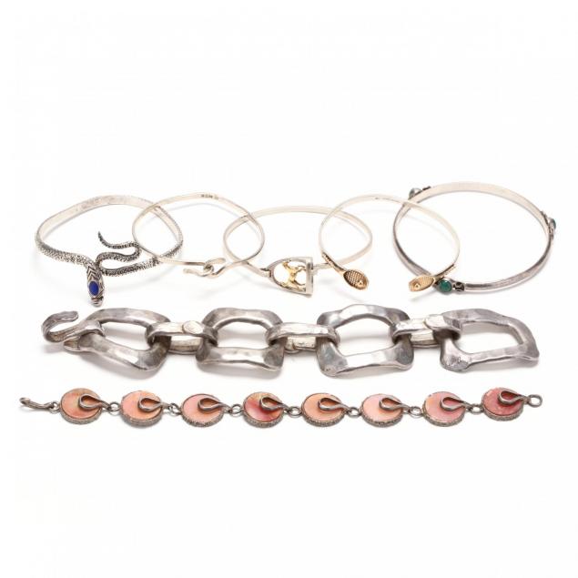 group-of-silver-bracelets