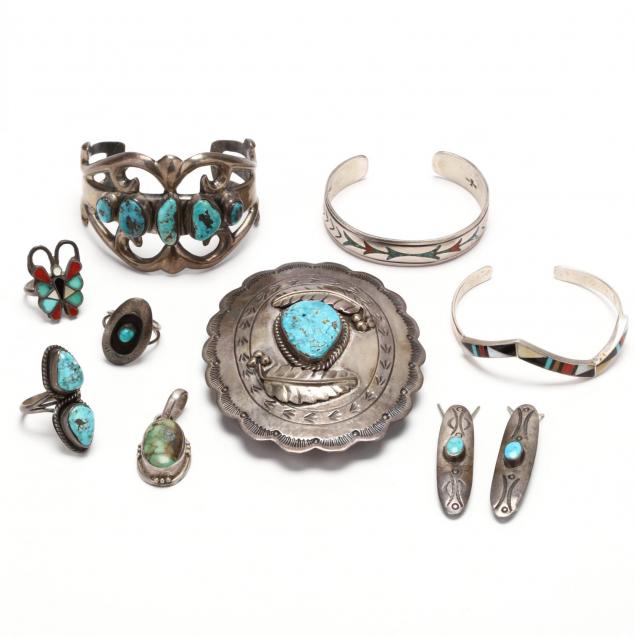 a-collection-of-native-american-silver-and-gemstone-items