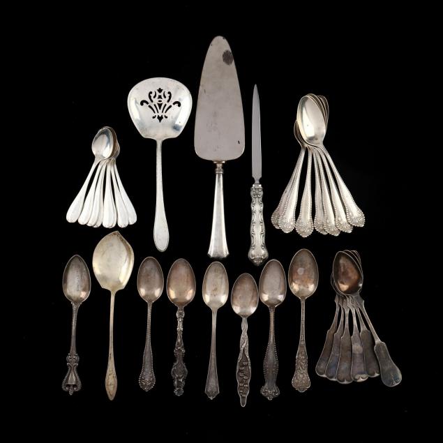 a-grouping-of-coin-silver-and-sterling-silver-flatware
