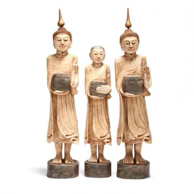 three-carved-and-painted-figures-of-buddha