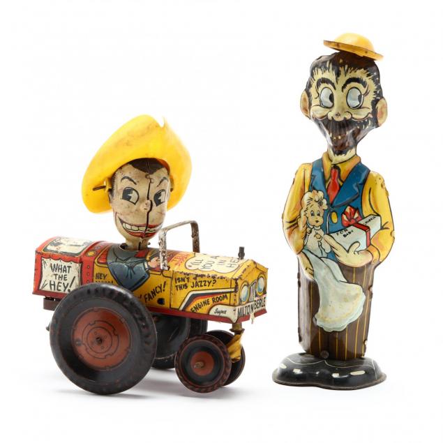 two-vintage-tin-wind-up-toys