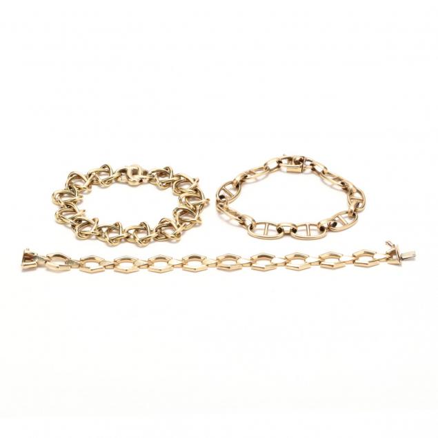 three-gold-bracelets