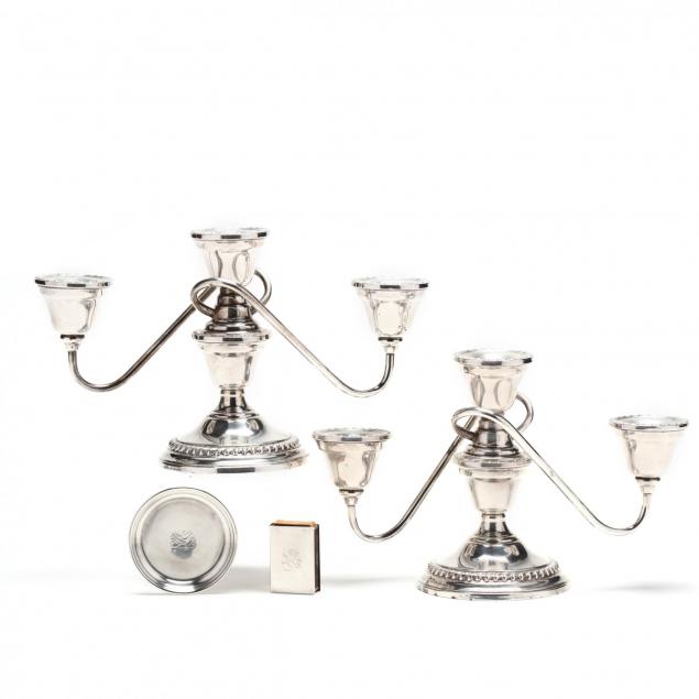 a-pair-of-sterling-silver-candelabra-and-match-set