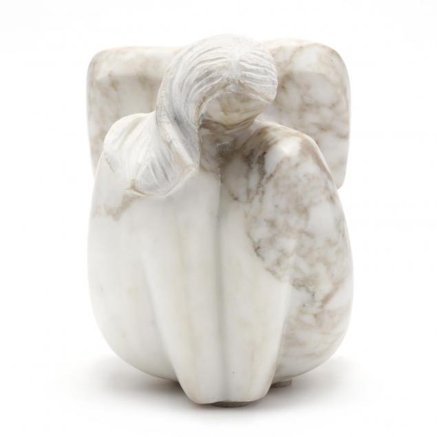 carved-marble-sculpture-of-a-nude-woman