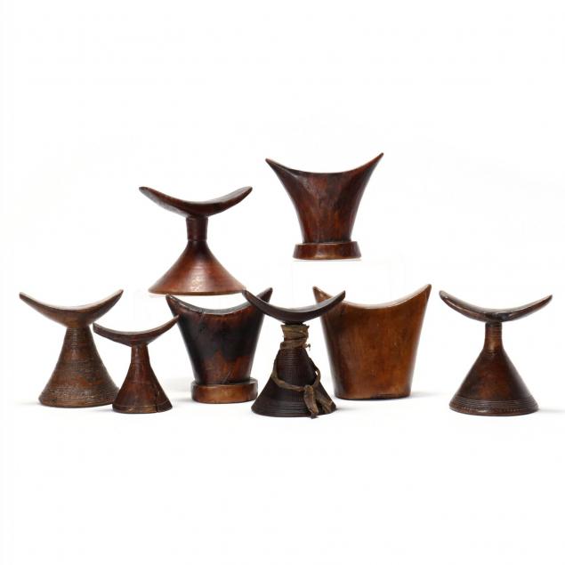eight-african-carved-wood-headrests-pillows