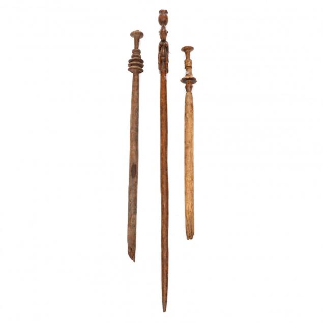 three-african-carved-wooded-walking-sticks