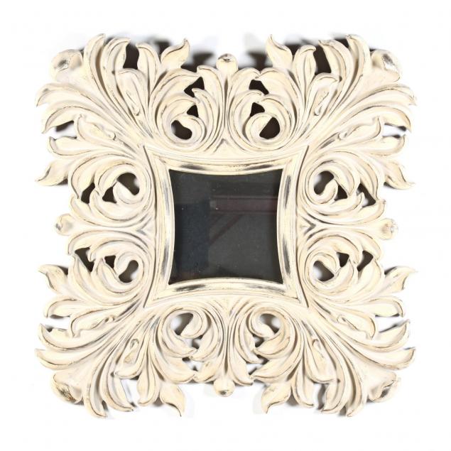 contemporary-mirror-in-openwork-foliate-frame