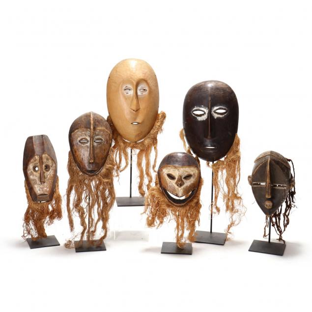 six-fang-style-wooden-masks