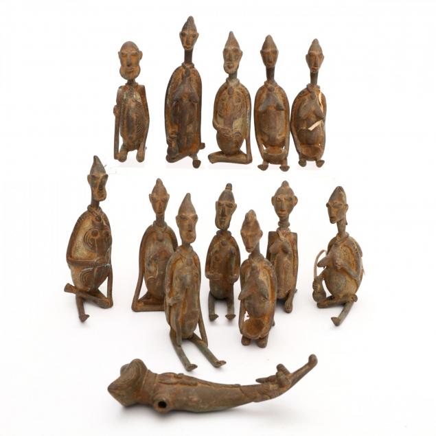 group-of-thirteen-diminutive-african-iron-figures