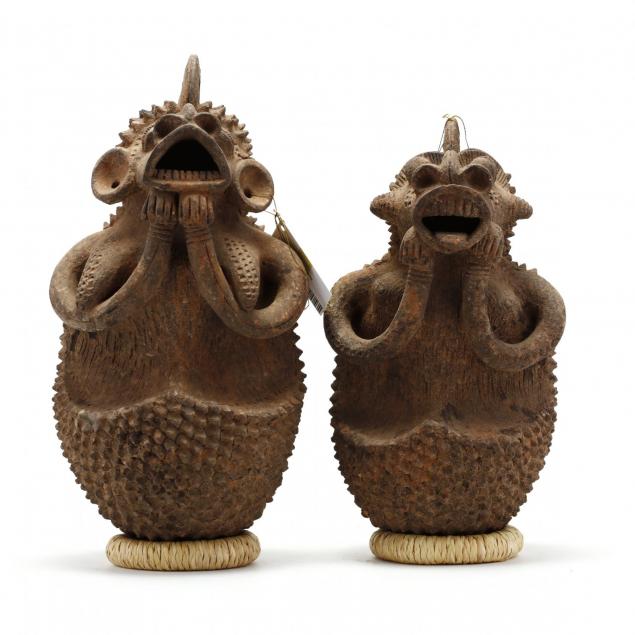 two-african-figural-vessels