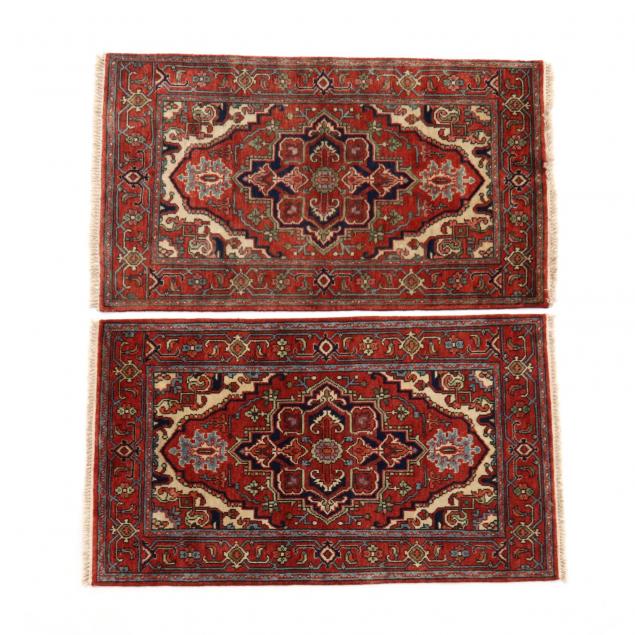 two-similar-indo-heriz-area-rugs