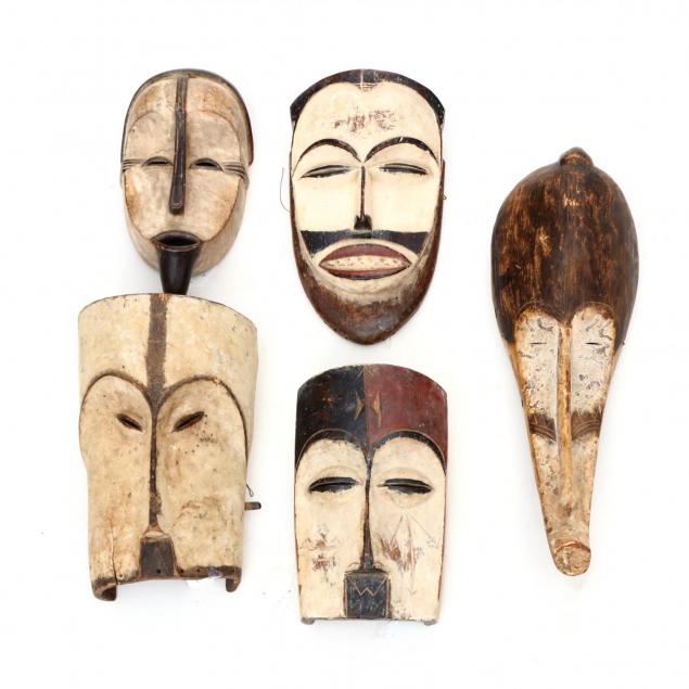 five-african-carved-and-painted-tribal-masks