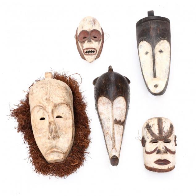 five-african-carved-and-painted-tribal-masks