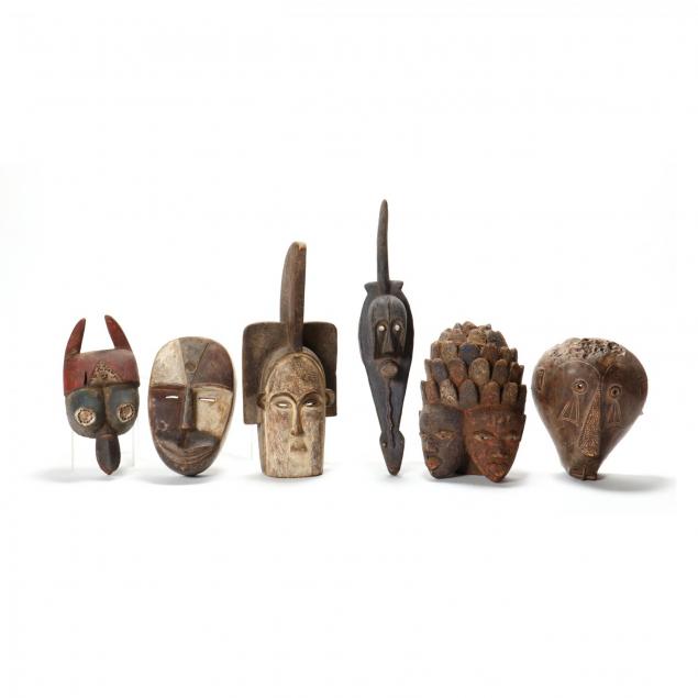 six-african-carved-tribal-masks