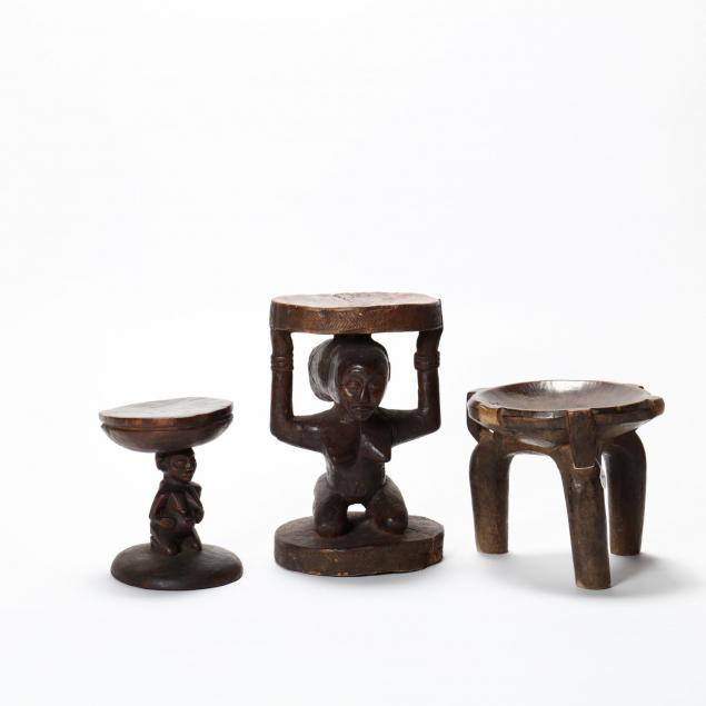three-african-carved-wooden-stools