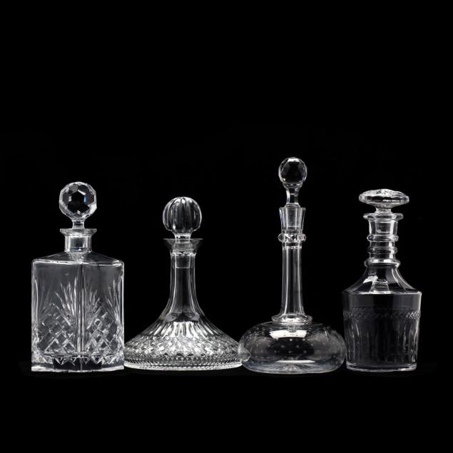 four-vintage-crystal-decanters