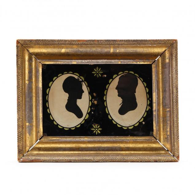 double-hollow-cut-silhouette-of-a-man-and-woman-american