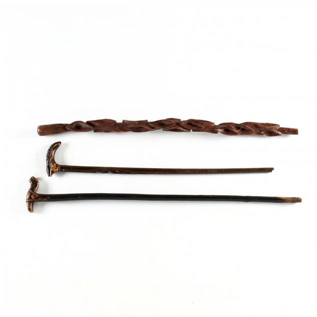 three-vintage-walking-sticks