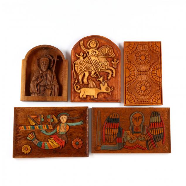 five-carved-wooden-plaques