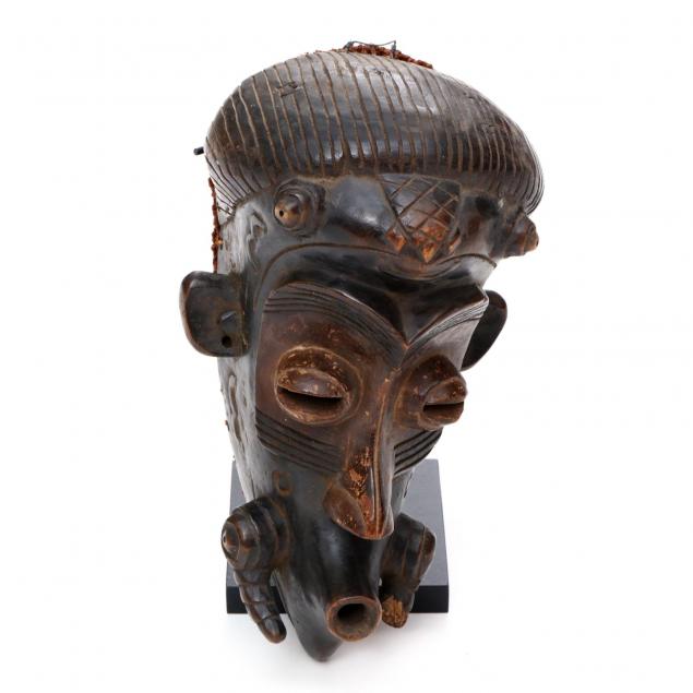 a-baule-mask-on-stand