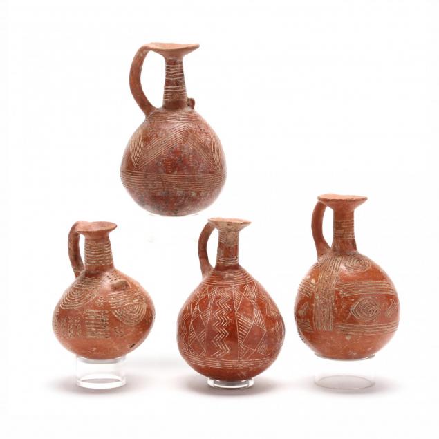 set-of-four-cypriot-early-bronze-age-polished-red-ware-jugs
