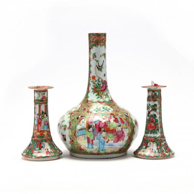 a-chinese-famille-rose-pair-of-candle-sticks-and-bottle-vase