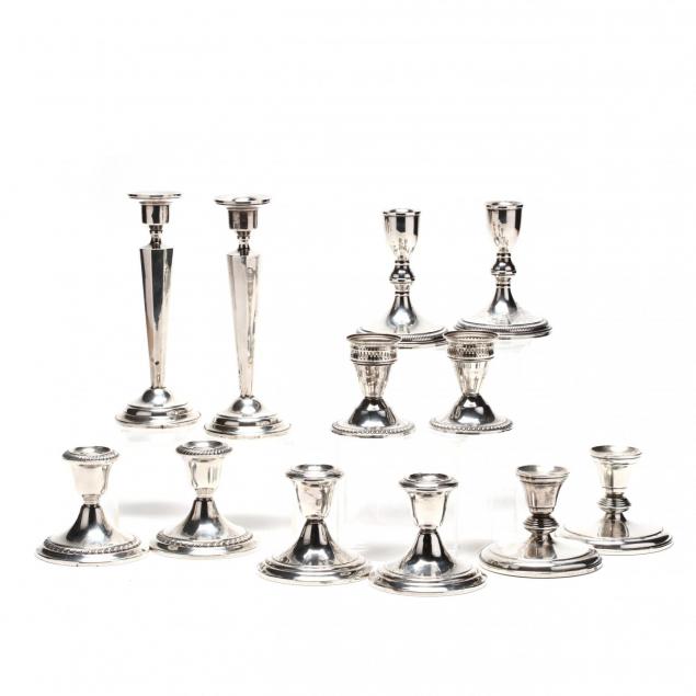 six-pairs-of-sterling-silver-candlesticks