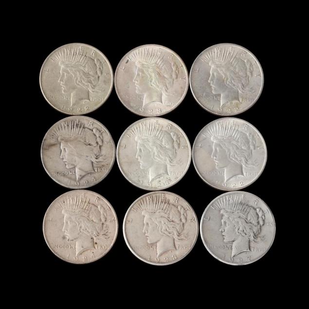 nine-circulated-peace-silver-dollars
