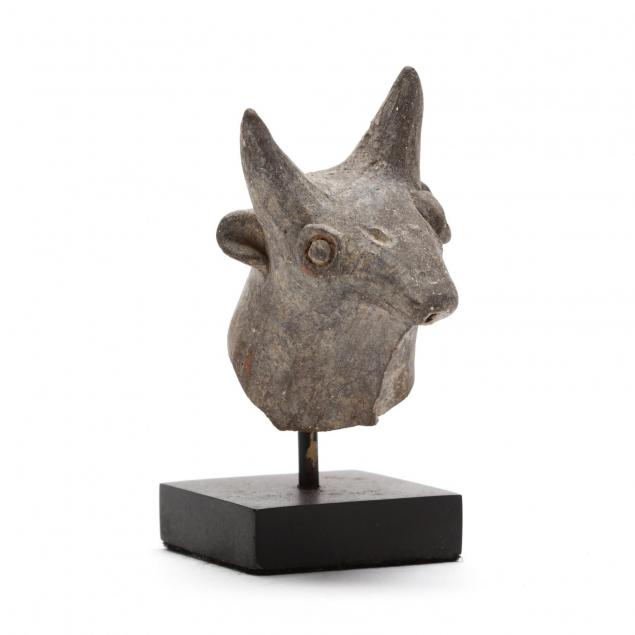cypriot-bronze-age-head-of-a-bull-from-a-larger-piece