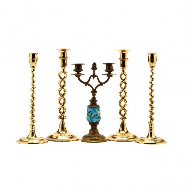 five-vintage-brass-candelsticks