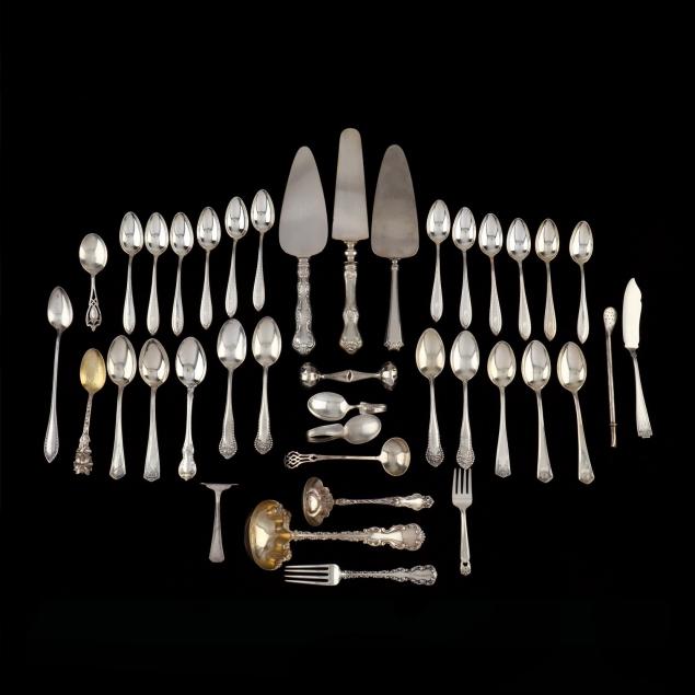 group-of-sterling-silver-flatware