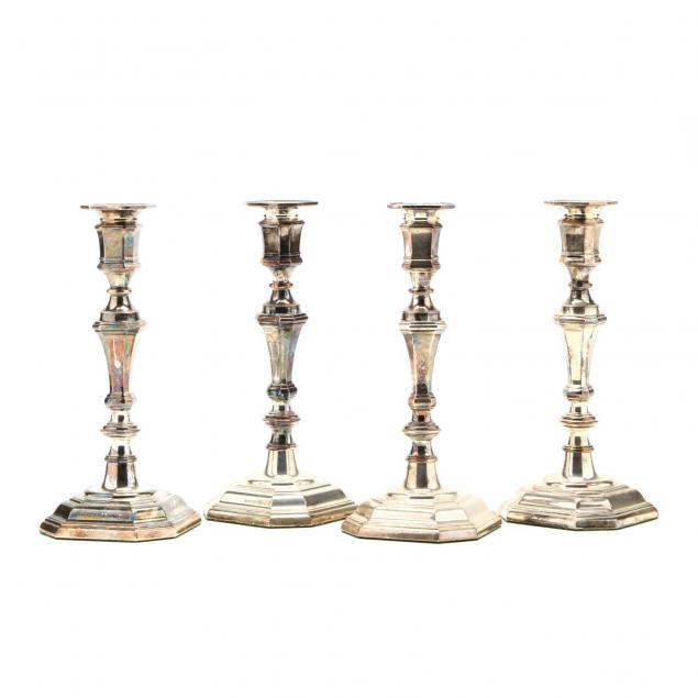 a-set-of-four-silverplate-candlesticks