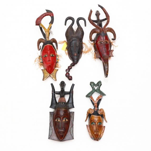 a-group-of-five-african-baule-guro-style-masks