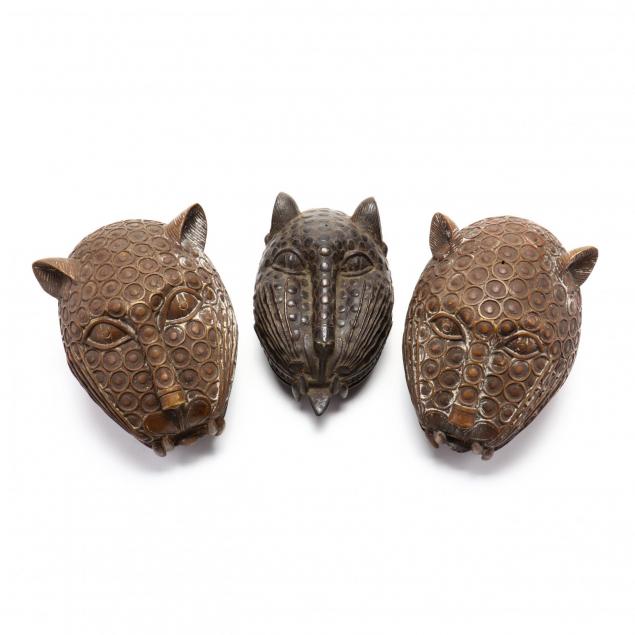 three-benin-bronze-leopard-heads