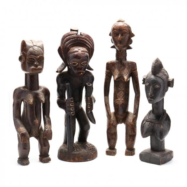 four-carved-african-figures