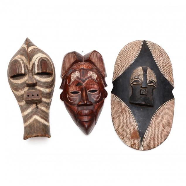 two-african-tribal-masks-and-one-songye-shield