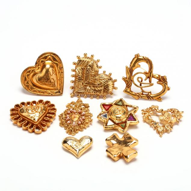 a-group-of-nine-gold-tone-brooches-christian-lacroix