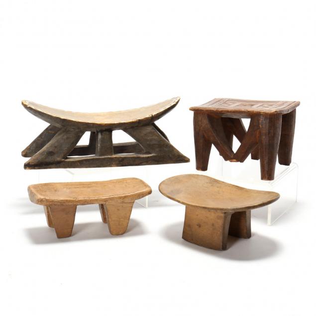 four-african-carved-wood-low-stools