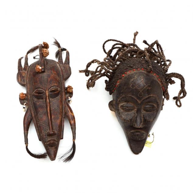 two-african-tribal-carved-wood-face-masks