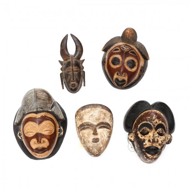 five-carved-and-painted-tribal-masks